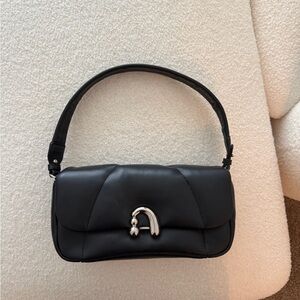 Chic Black Shoulder Bag with Silver Accent